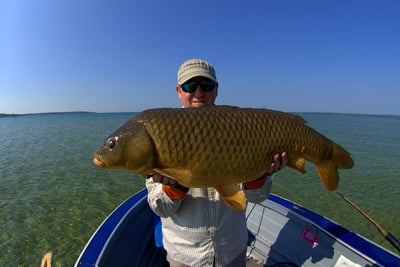 Cameron Mortenson with a 34-pound carp