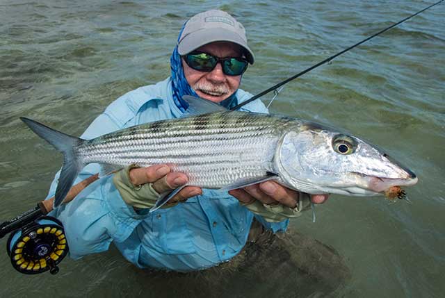 Bill Blanton shows off a 6-pound bonefish caught on the flats of Cayo Paredon, Cuba.