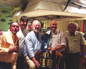 “Quit Your Bitchin” team receiving SailFly Trophy left to right: Mate Robert Morrison, Capt Randy Towe, Tournament Chairman, Sandy Moret, Bernard Paul-Hus and Mate Mike”